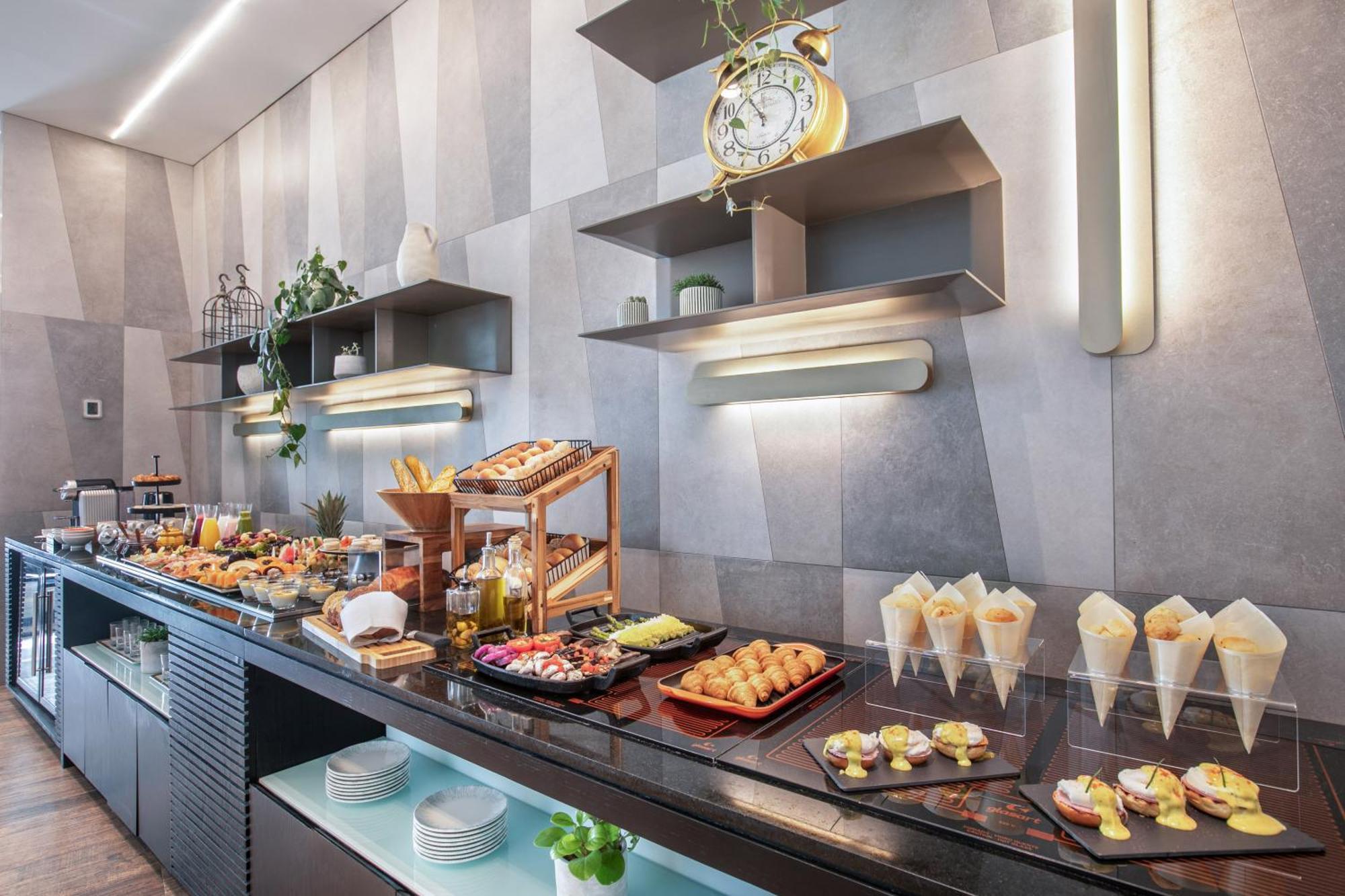 فندق مليا جارديم أوروبا ساو باولو المظهر الخارجي الصورة A buffet at a hotel